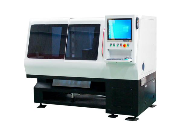 Fiber laser material pulling and pipe cutting machine